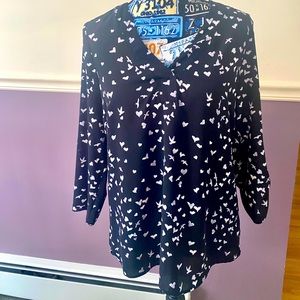 DR2 blouse with hearts and birds .